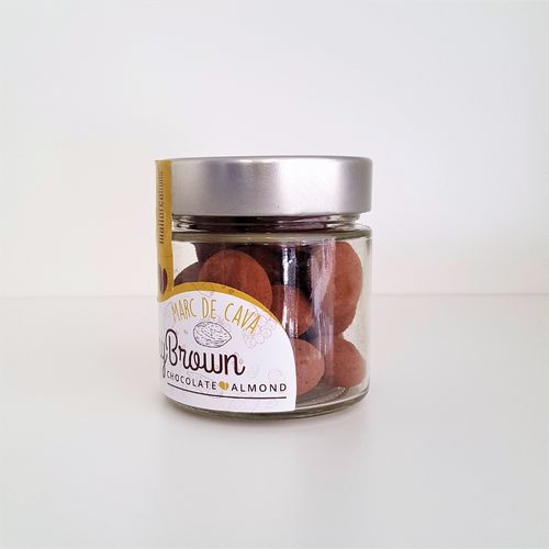 "Jimmy Brown" almond covered by champagne flavored chocolate. 125g glass jar