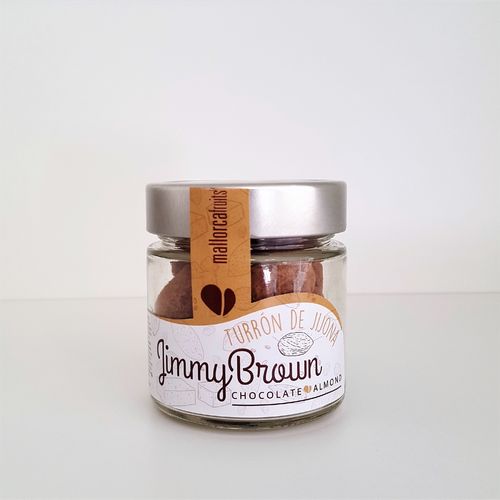 Almond covered by Jijona´s Nougat flavored chocolate and cocoa. Presented in 125g glass jar